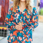 All I Ask Teal Floral Abstract Print V Neck Smocked Top