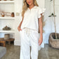 Double Take Full Size Texture Ruffle Short Sleeve Top and Wide Leg Pants Set