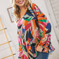 Multi Geo Woven Babydoll V-Neck Top